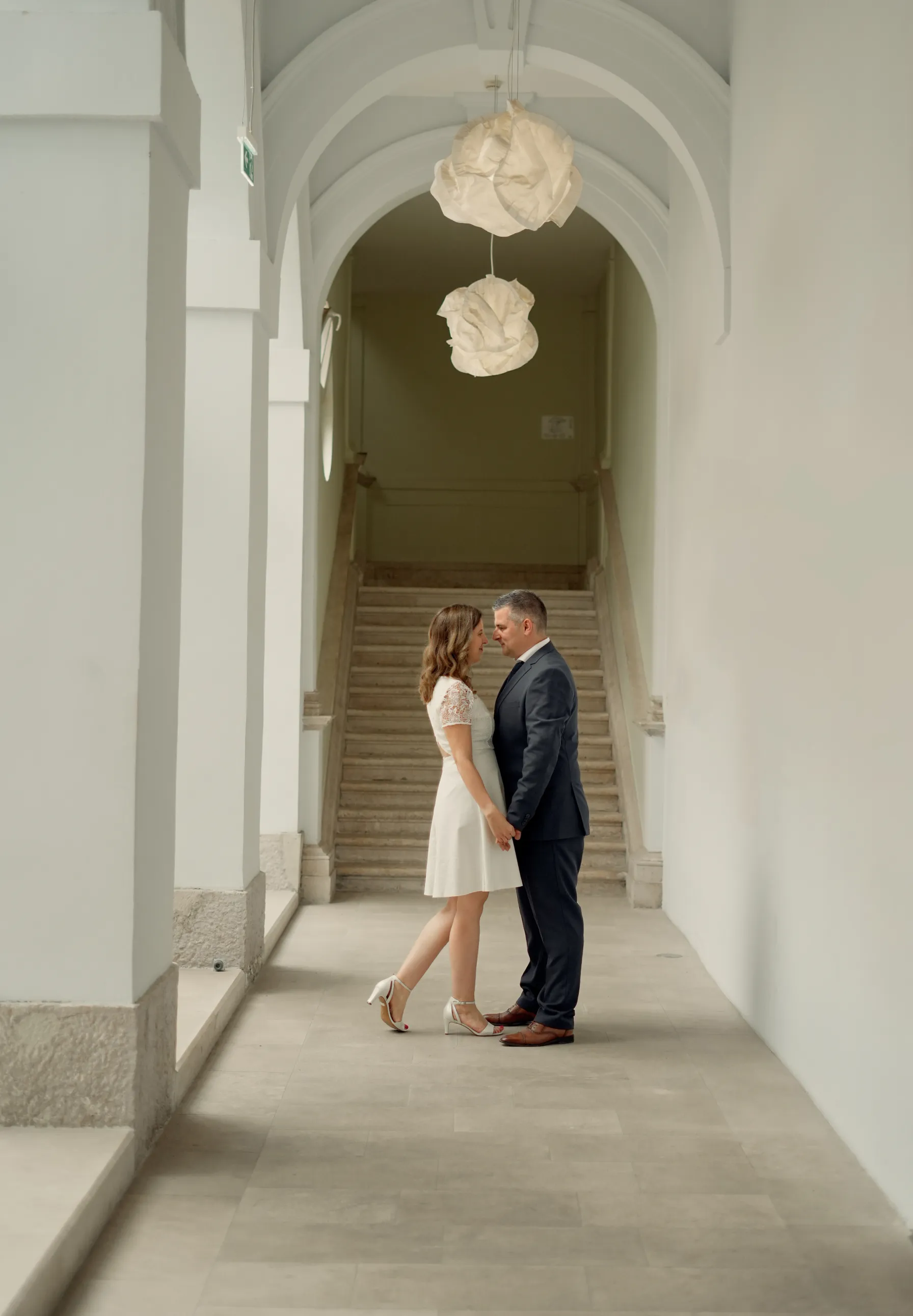 Wedding couple portrait in elegant archway corridor in Zadar