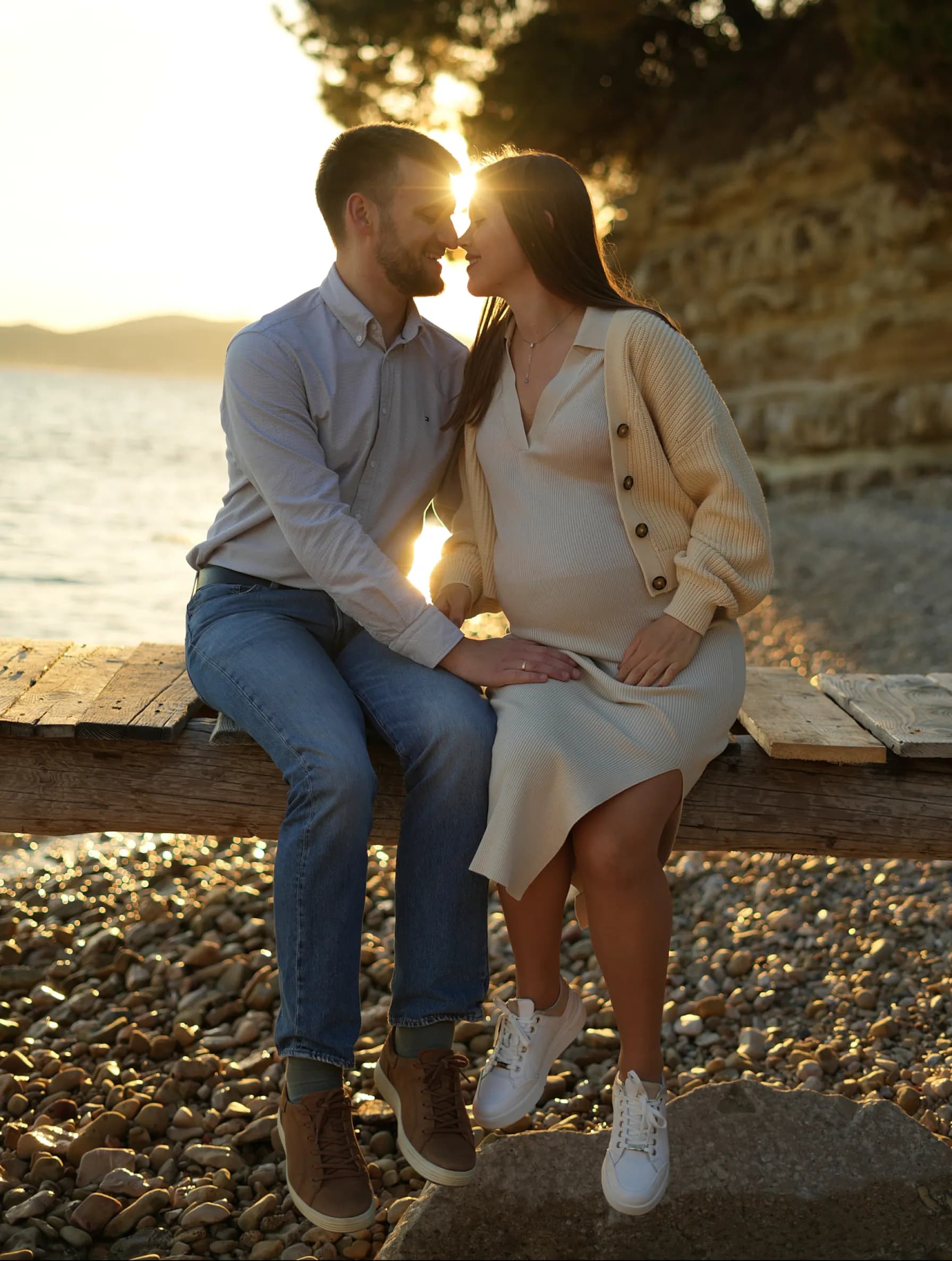 Maternity couple portrait at sunset on Croatian coast